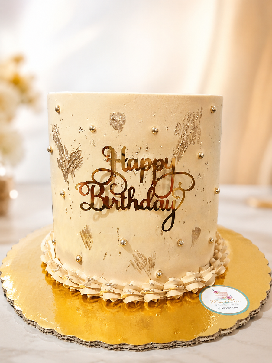Pastel dorado de cumpleaños